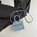 Mini sac à main bleu clair minimaliste avec poignée fixe et bandoulière assortie - Bleu