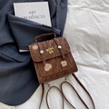 Mini mochila retro de cuero marrón oscuro con bordados y patrones de tostadas - Marrón