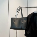 Minimalist black faux leather large tote bag with long shoulder straps and matte finish - Black