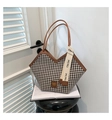 Detail of houndstooth tote bag showing leather strap and decorative logo silk ribbon - Brown