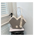 Detail of V-shaped houndstooth tote bag with white leather trim and fashion ribbon - White