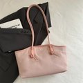 Borsa tote intrecciata rosa in pelle cerata con tracolle annodate e logo fashion - Rosa