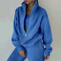 Bright blue women's two-piece sports set with half-zip sweatshirt and matching joggers - Blue