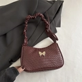 Deep burgundy underarm bag with woven texture, golden butterfly, and ruched handle - Dark Brown
