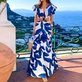 Elegantes weißes Maxikleid mit blauem Blattmuster, tiefem V-Ausschnitt und Cut-outs - S / Blau Bedruckt