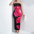 Detail of elegant slim fit tube dress with vibrant pink floral prints on black fabric - Black Red