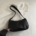 Minimalist black woven hobo shoulder bag with textured faux leather craftsmanship - Black