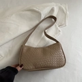 Light brown woven leather dumpling bag with minimalist texture and slim shoulder strap - Khaki