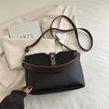 Large capacity black pebble leather bucket bag with contrast brown straps and silver lock - Black