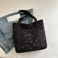Black corduroy tote bag with strawberry print and side pockets for casual daily use - Black
