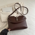 Dark brown faux leather bucket bag with silver twist lock and dual adjustable straps - Brown