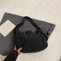 Minimalist black denim messenger bag with wide adjustable strap and vintage texture - Black