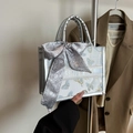 Silver tote bag with butterfly embroidery and decorative silk scarf accessory - Silver