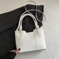 Borsa a mano moderna in ecopelle bianca con doppi manici e tracolla sottile - Bianco