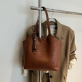 Brown woven tote bag for women with large capacity and stylish gold charm accessory - Brown with Pendant
