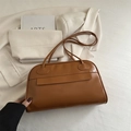 Retro brown leather bowling shoulder bag with vintage top handle and minimalist design - Brown