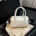White snake-textured pillow bag with golden hardware and top handles - White (Without Charm)