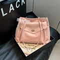 Minimalist light pink crossbody bag with a white lace bow and gold chain strap - Pink