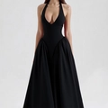 Elegant black halter neck maxi dress with deep V-neck and pleated flowing skirt - S / Black