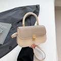 Chic beige crossbody bag with silver glitter flap and golden metallic twist lock - Gold