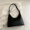 Minimalist black crescent hobo bag in matte faux leather with wide shoulder strap - Black