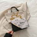 Chic black and white crossbody bag with butterfly print and gold chain strap - Black
