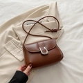 Minimalist brown faux leather crossbody bag with silver U-shaped metal buckle detail - Brown