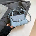 Light blue contrast flap handbag with gold metal lock and leather texture for women - Blue