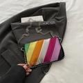 Rainbow stripe chain bag with metallic leather and silver studs on a stylish background - Black