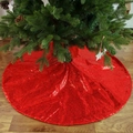 Gonna per albero di Natale con paillettes rosse brillanti su pavimento in legno - 120cm / Rosso Glitterato