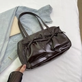 Deep brown glossy shoulder bag with pleated bow pockets and vintage retro aesthetic - Brown