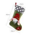 Christmas gnome stocking in dark green with grey polka dot trim and striped sleeves - Green