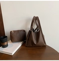 Detail of dark brown lychee pattern leather tote bag set with matching inner pouch - Coffee