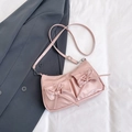 Pink faux leather shoulder bag with decorative bows and dual front flap pockets - Pink