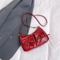 Red glossy patent leather shoulder bag with chic bow pockets and slim strap for women - Red