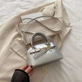 Silver metallic PU leather handbag with golden hardware and adjustable shoulder strap - Silver