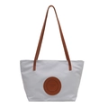 Minimalist grey tote bag with brown handles and a round fashion bags logo patch - Light Blue Large