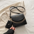 Chic black crossbody bag with gold chain decoration and matching small coin pouch - Black