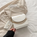 Elegant white crossbody bag with gold chain and matching mini pouch for women. - White
