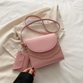 Elegant pink crossbody bag with gold chain decoration and matching small coin pouch - Pink