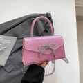 Funkelnde rosa Glitzertasche mit Strass-Schleifenschnalle und Metallkettenriemen - Rosa