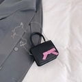 Mini borsa a tracolla nera per bambini con fiocco rosa e tracolla a catena d'argento - Nero