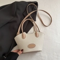 Bolso saco de tejido crema con asas de cuero marrón y correa ajustable - Caqui