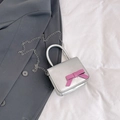 Mini borsa a mano argento per bambine con fiocco rosa e tracolla a catena in metallo - Argento
