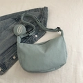 Light blue corduroy crescent crossbody bag with matching round coin purse and wide strap - Green