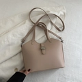 Minimalistische beige Beuteltasche aus PU-Leder mit silbernem Schloss und Griff - Khaki
