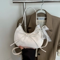 White crescent underarm bag with a bow detail and elegant pearl lace charm - White With Pendant