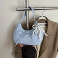Light blue crescent shoulder bag with bow and pearl lace charm in soft suede finish - Blue with Pendant