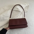 Dark burgundy baguette bag with woven texture and elegant gold metallic accents - Red