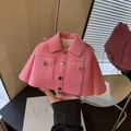 Pink jacket-style chain shoulder bag with lapels and silver buttons in hand - Pink